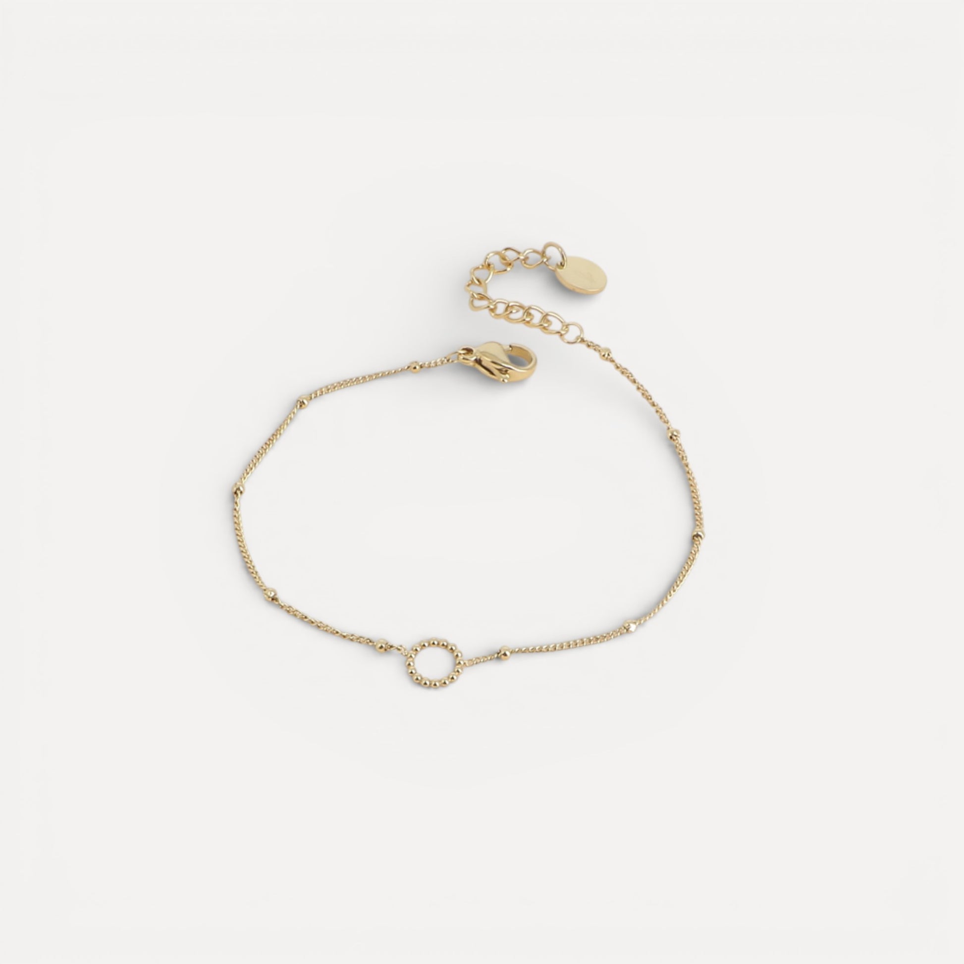 Bracelet chaîne boules et cercle milgrain en acier doré