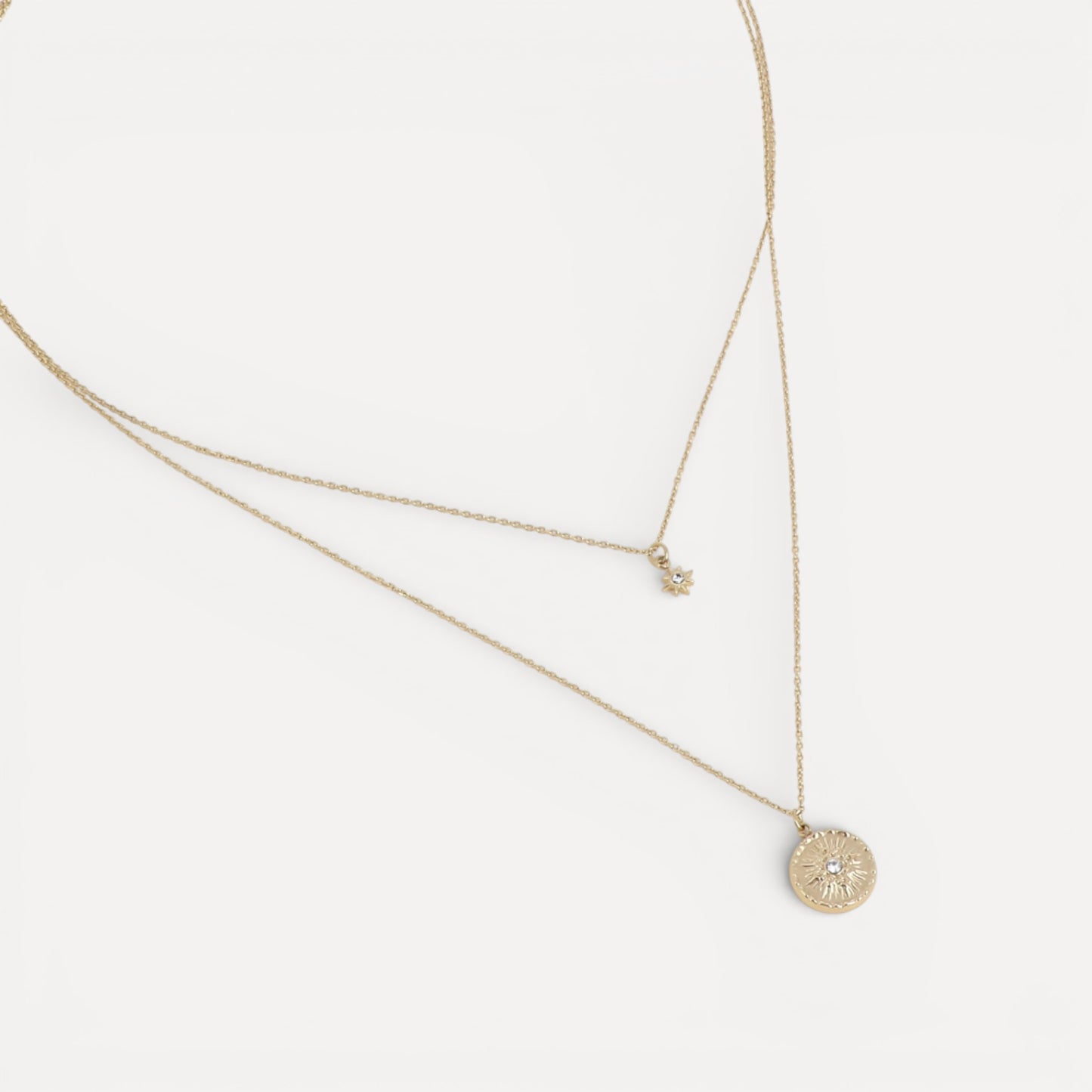 Collier 2 rangs étoile du nord et médaillon étoile martelée en acier doré